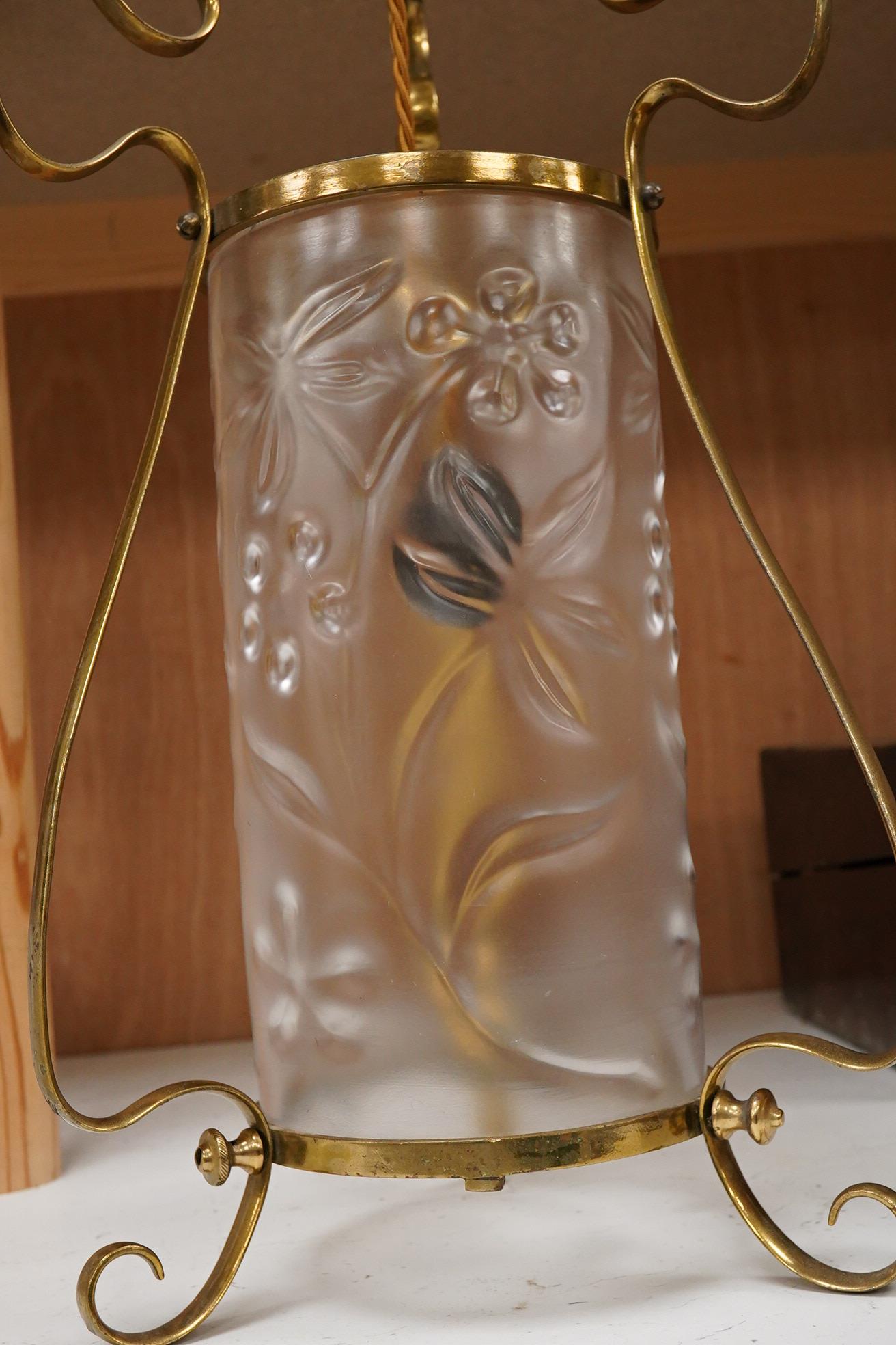 An Art Nouveau frosted glass and a brass hanging lamp, 54cm